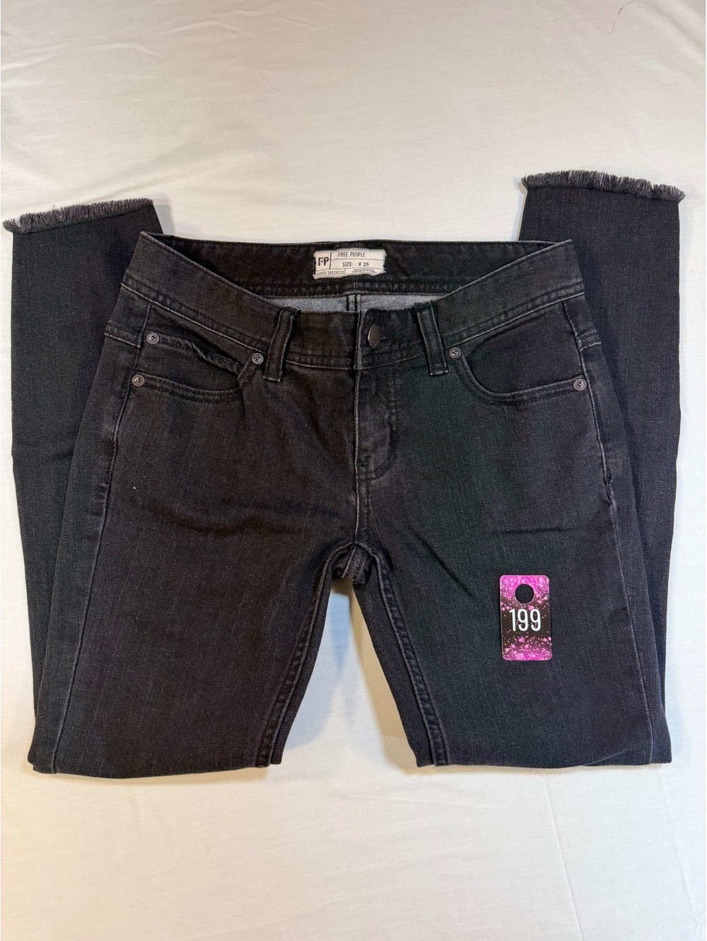 Free People Black Skinny Jeans Size W25 with Raw Hem and Knee Distress